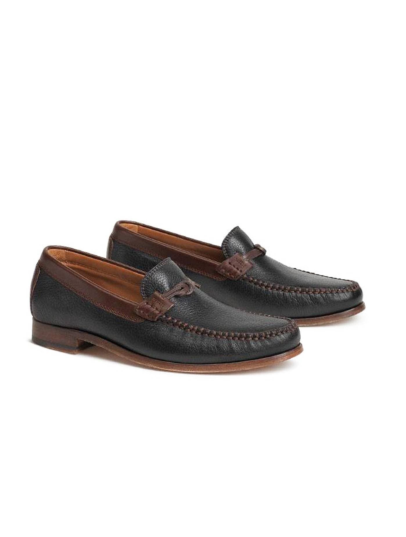 classic dark brown loafer, detailed with a nautical-style knot