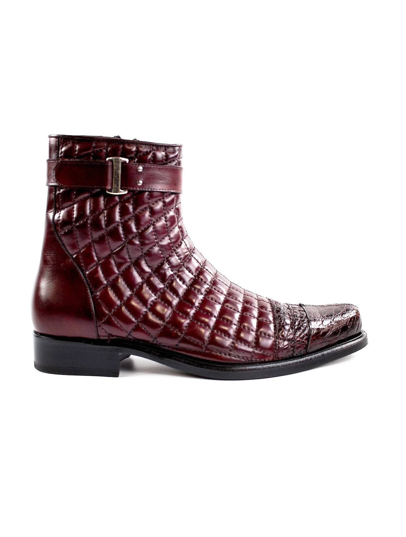 leather boots in dark red color textured like crocodile skin
