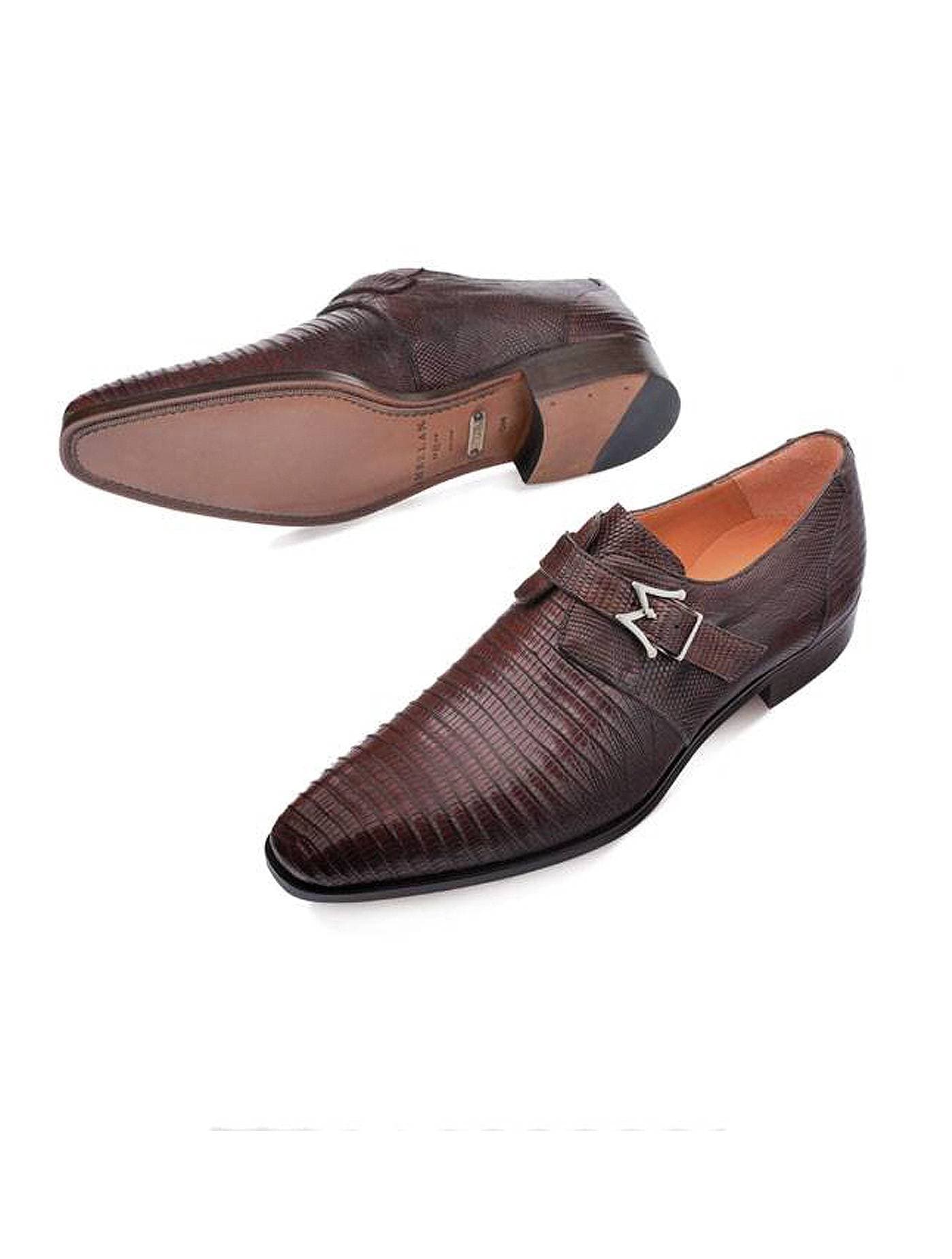 Full view front and sole of a brown lizard-pattern leather monk strap dress shoes with silver buckle on a white background.