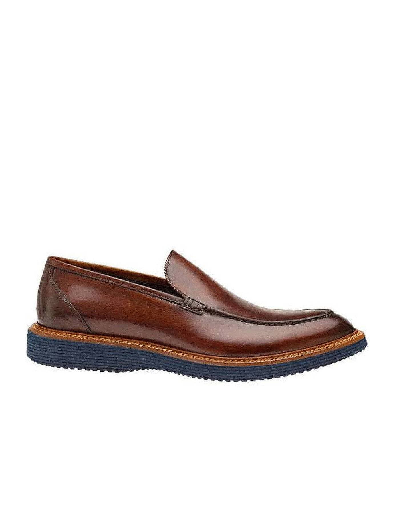 brown men's loafer shoe with blue sole