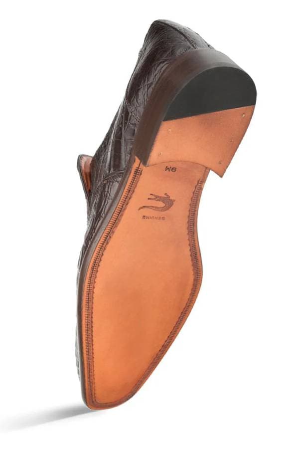 Bottom view of the loafer displaying a smooth leather sole with reinforced heel, stamped with brand details.