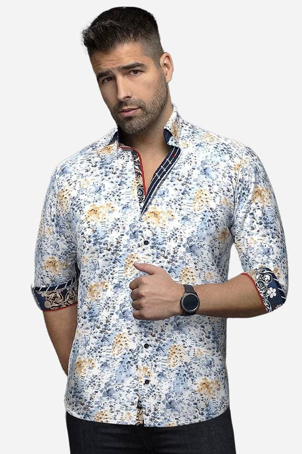 Men wearing a printed leaves and flowers shirt, in shades of blue and yellow.