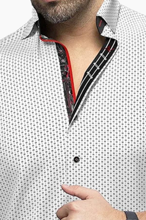 Close-up view of white chemise with black and white diamond print details