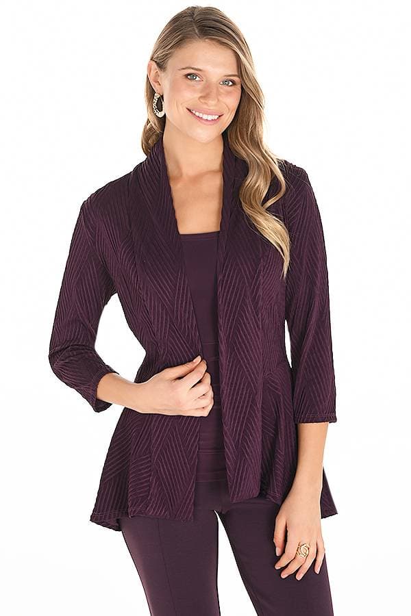 Front view of a woman wearing a wine-colored textured open-front jacket with a geometric diamond pattern