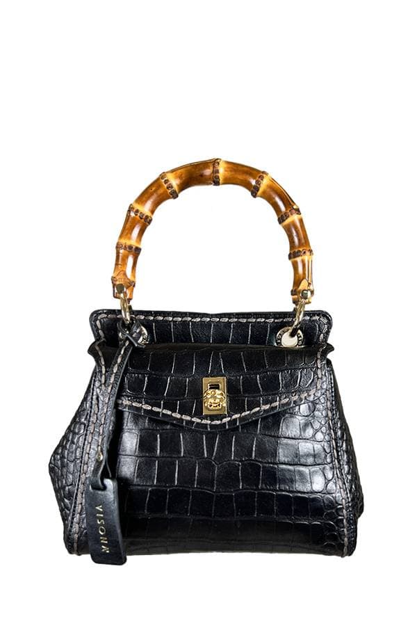 Black crocodile-embossed leather handbag with a bamboo handle