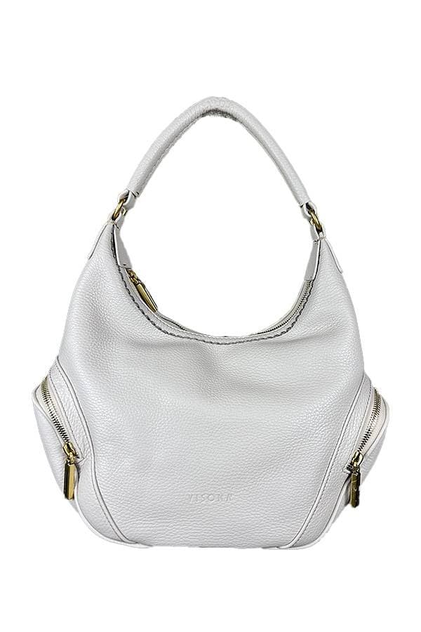 White handbag with a single handle, gold zipper accents on both sides, and a spacious slouchy body.