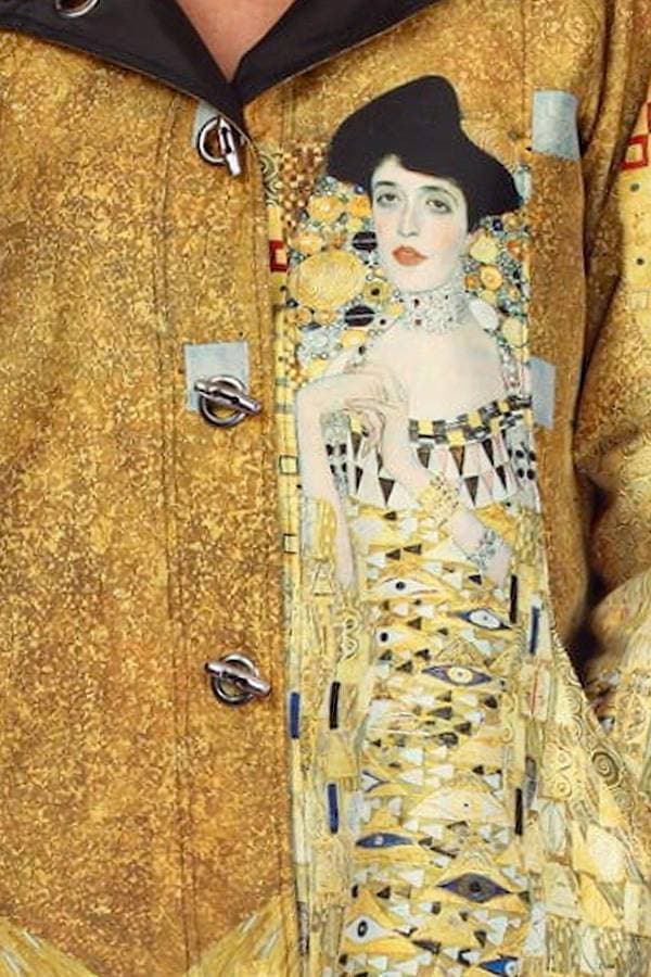 Lady in Gold Raincoat
