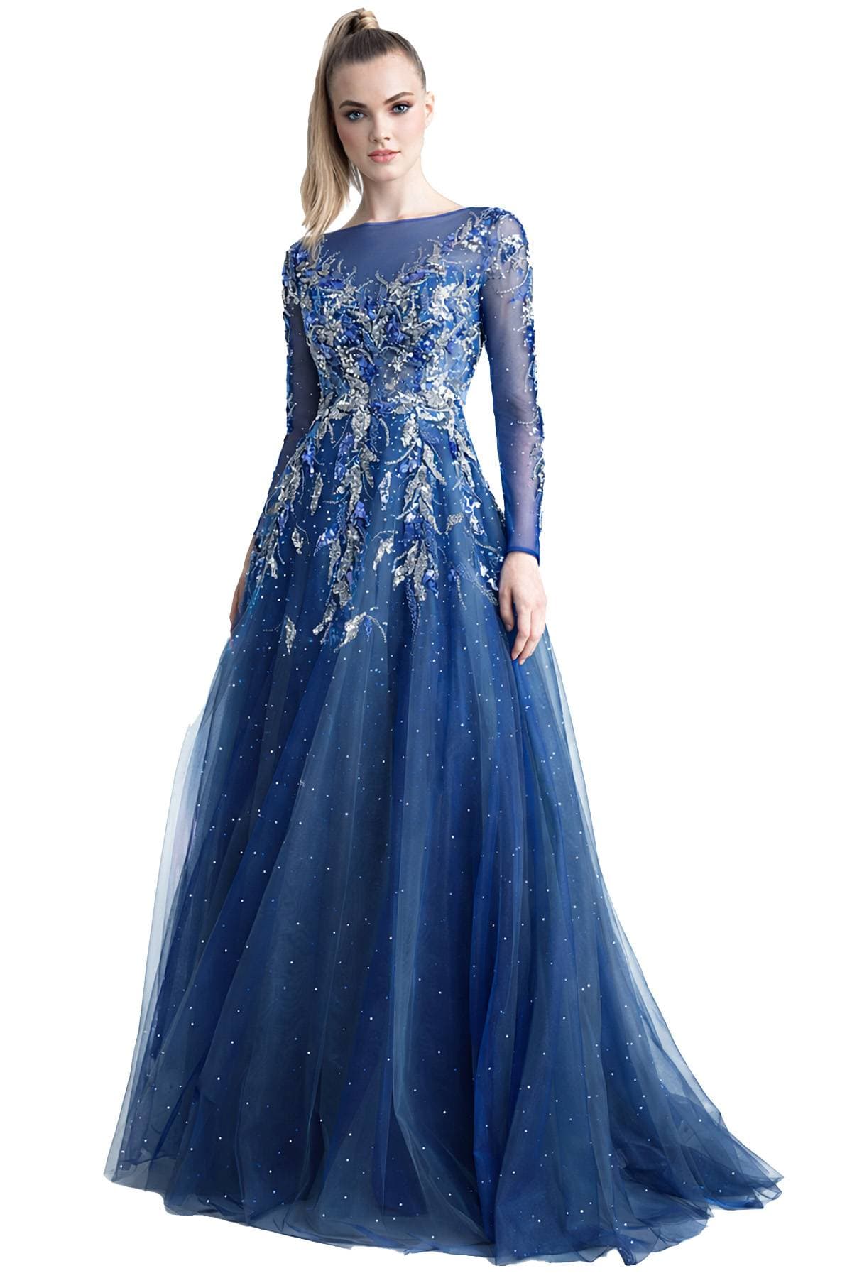 A woman wearing a long, blue evening gown adorned with intricate silver detailing and sparkling embellishments.