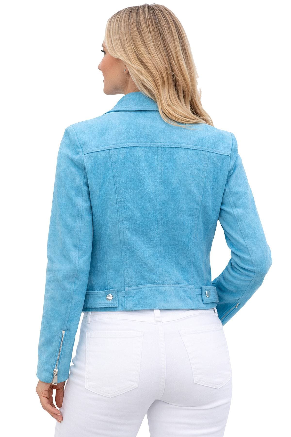 A person is wearing a light blue jacket and white pants, viewed from the back.