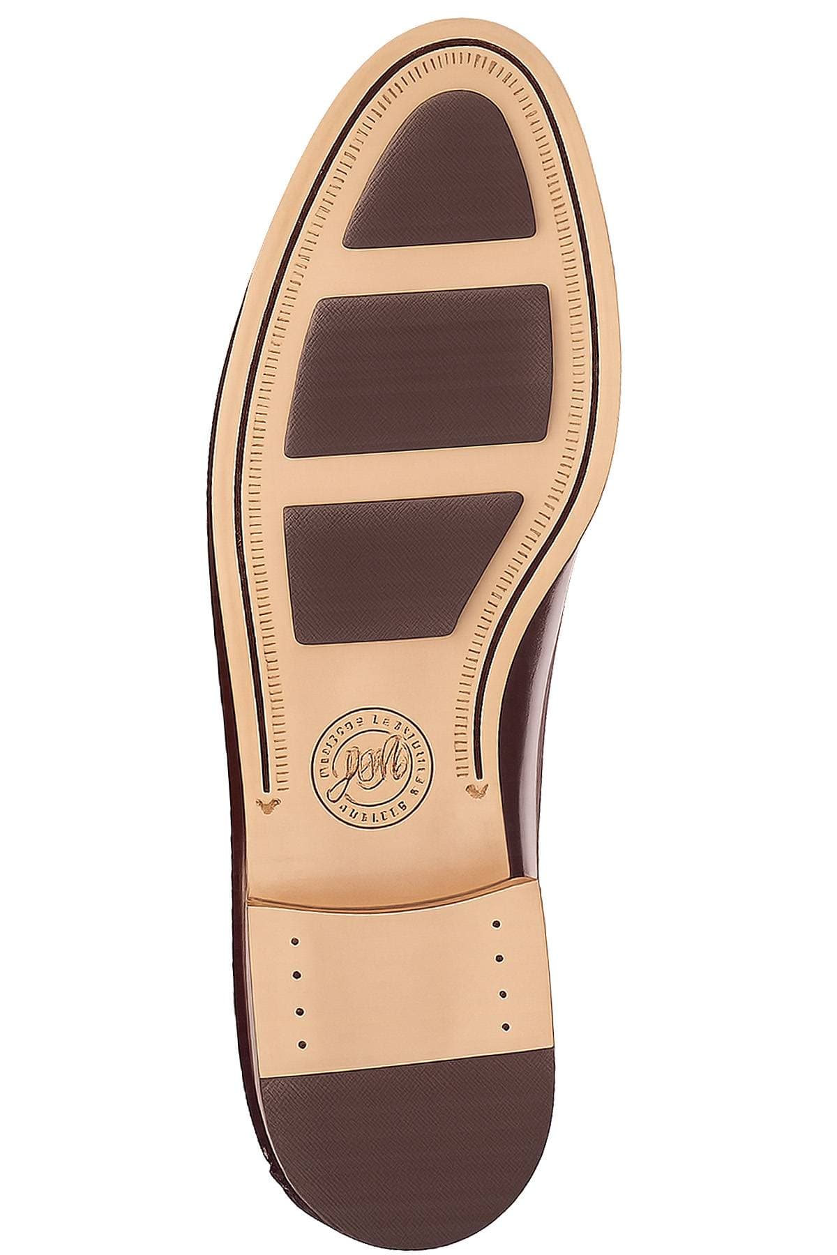 The image shows the sole of a shoe with a patterned tread design and logo imprint.