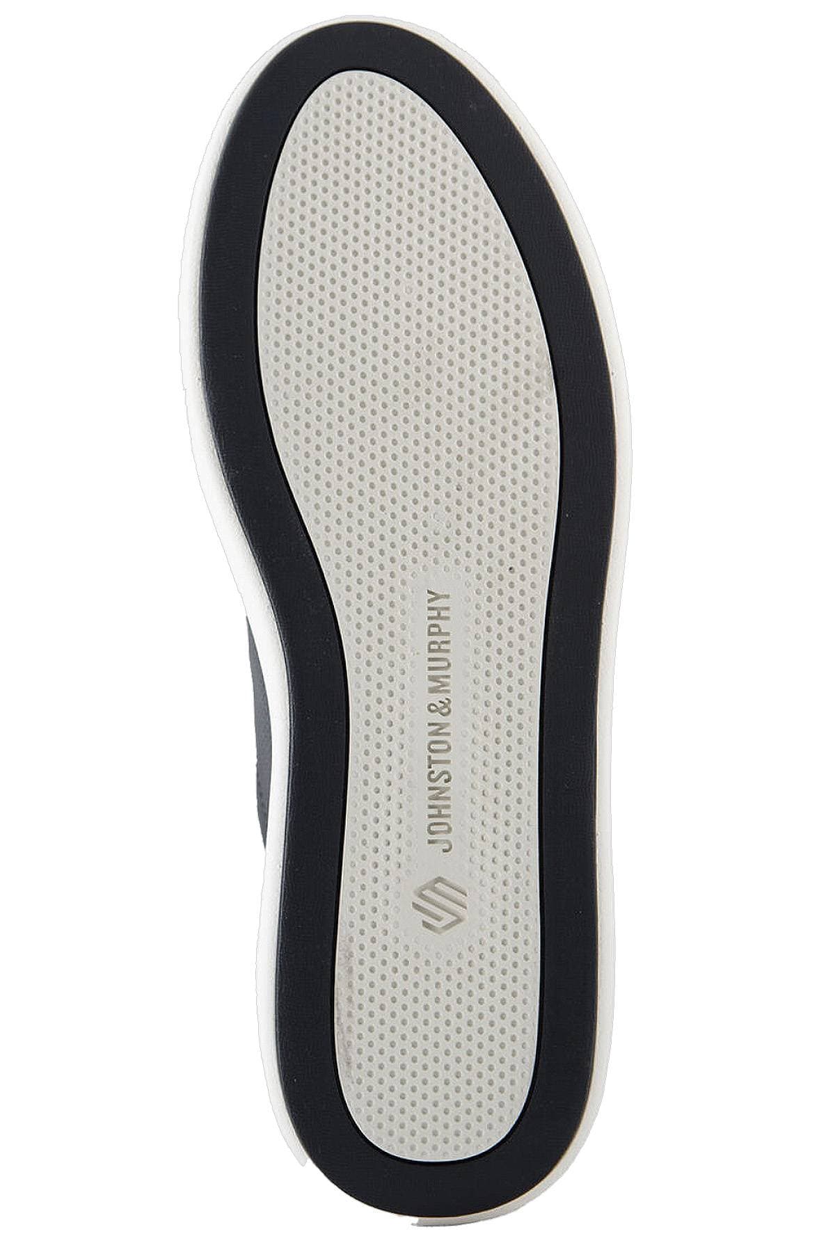 The image shows the bottom of a shoe with the text "Johnston & Murphy" along the sole.