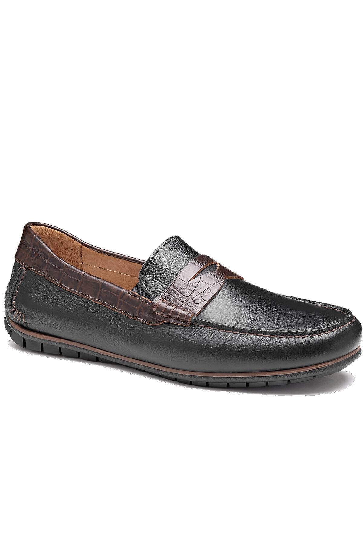 A black leather loafer featuring brown crocodile-patterned accents.