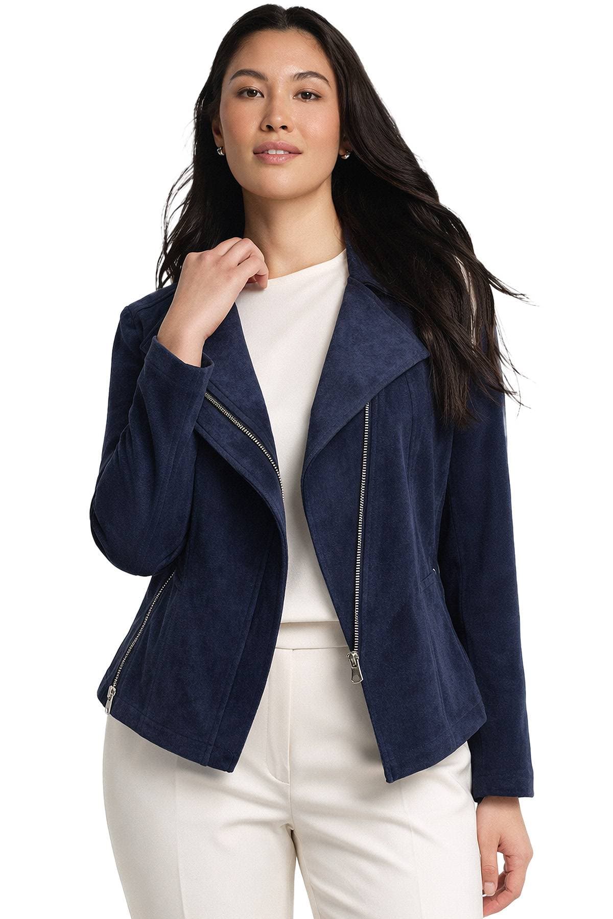A person wearing a navy blue jacket over a white top and pants.