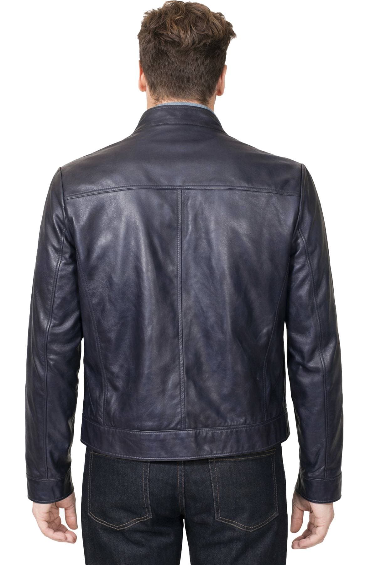 A person is wearing a dark leather jacket viewed from the back.