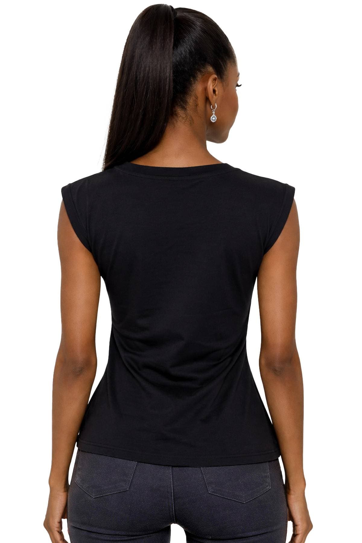 The image shows a woman with long hair in a ponytail, wearing a black sleeveless top and jeans, viewed from the back.