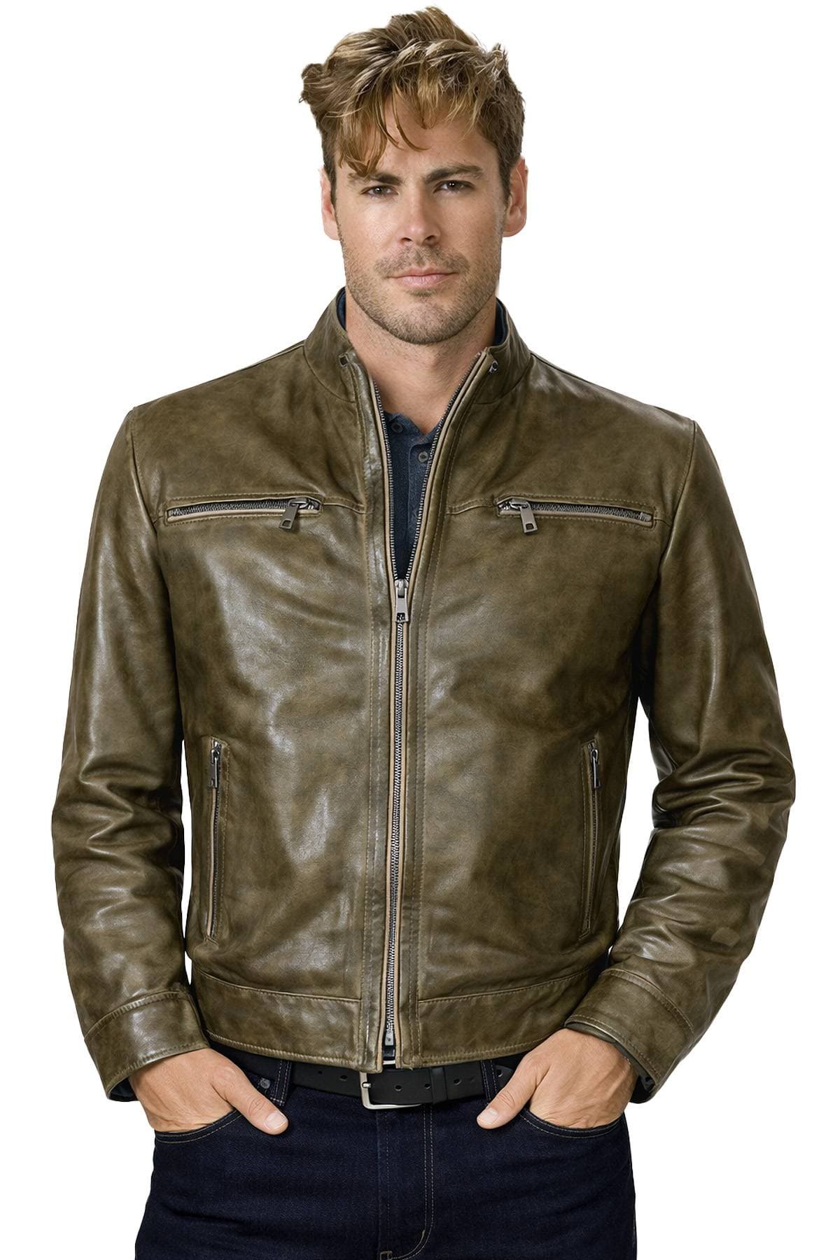 A man is wearing a brown leather jacket with both hands in his pockets.