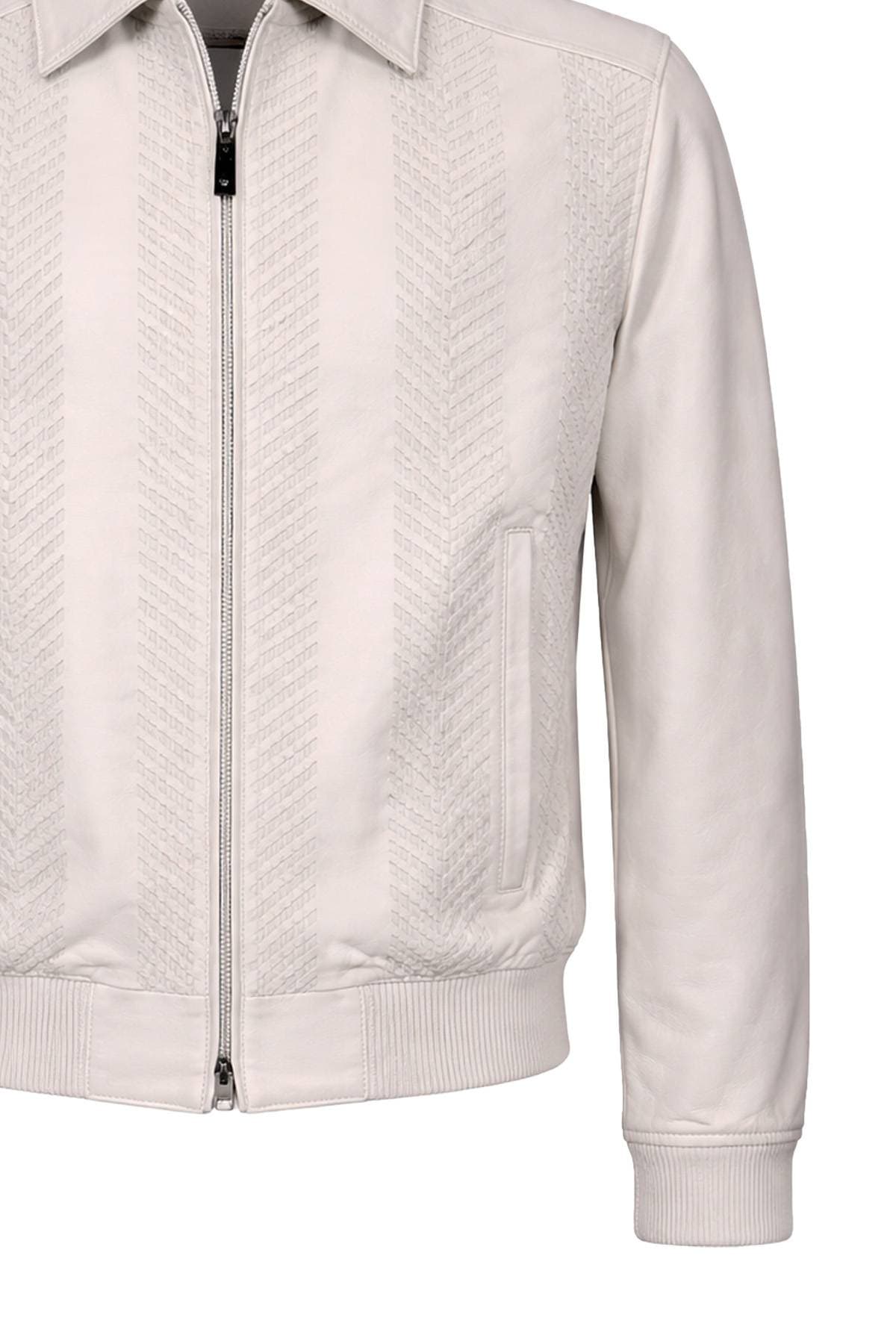 A light-colored leather jacket with a zipper front and patterned texture.