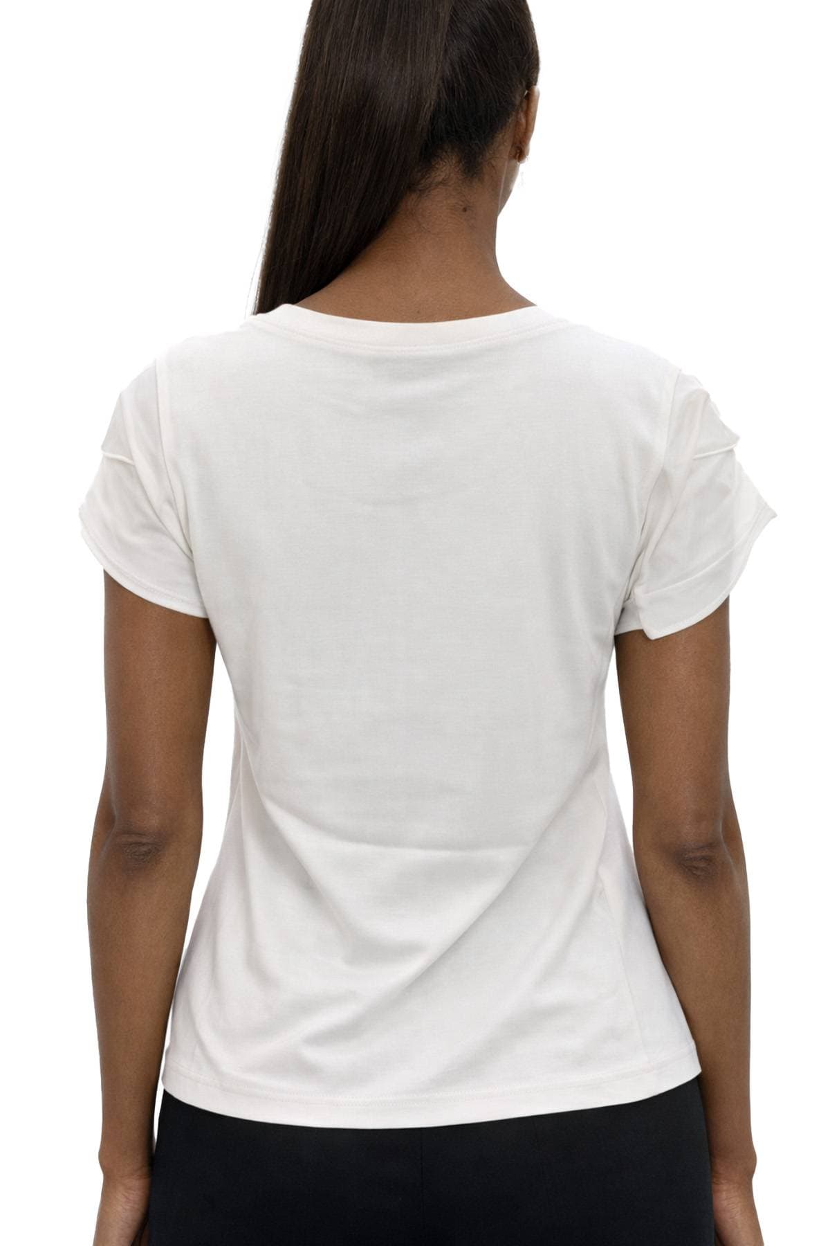 A person wearing a plain white T-shirt is shown from the back.