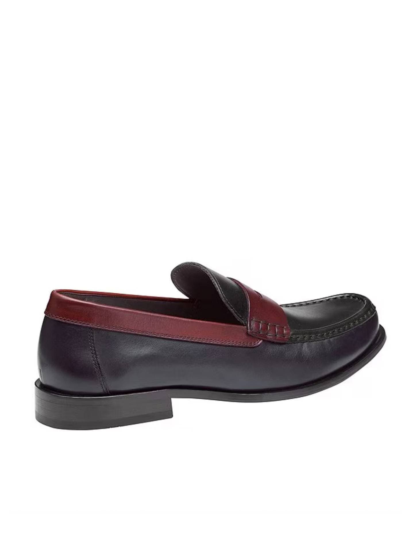 A dark leather loafer with a burgundy accent and black sole.