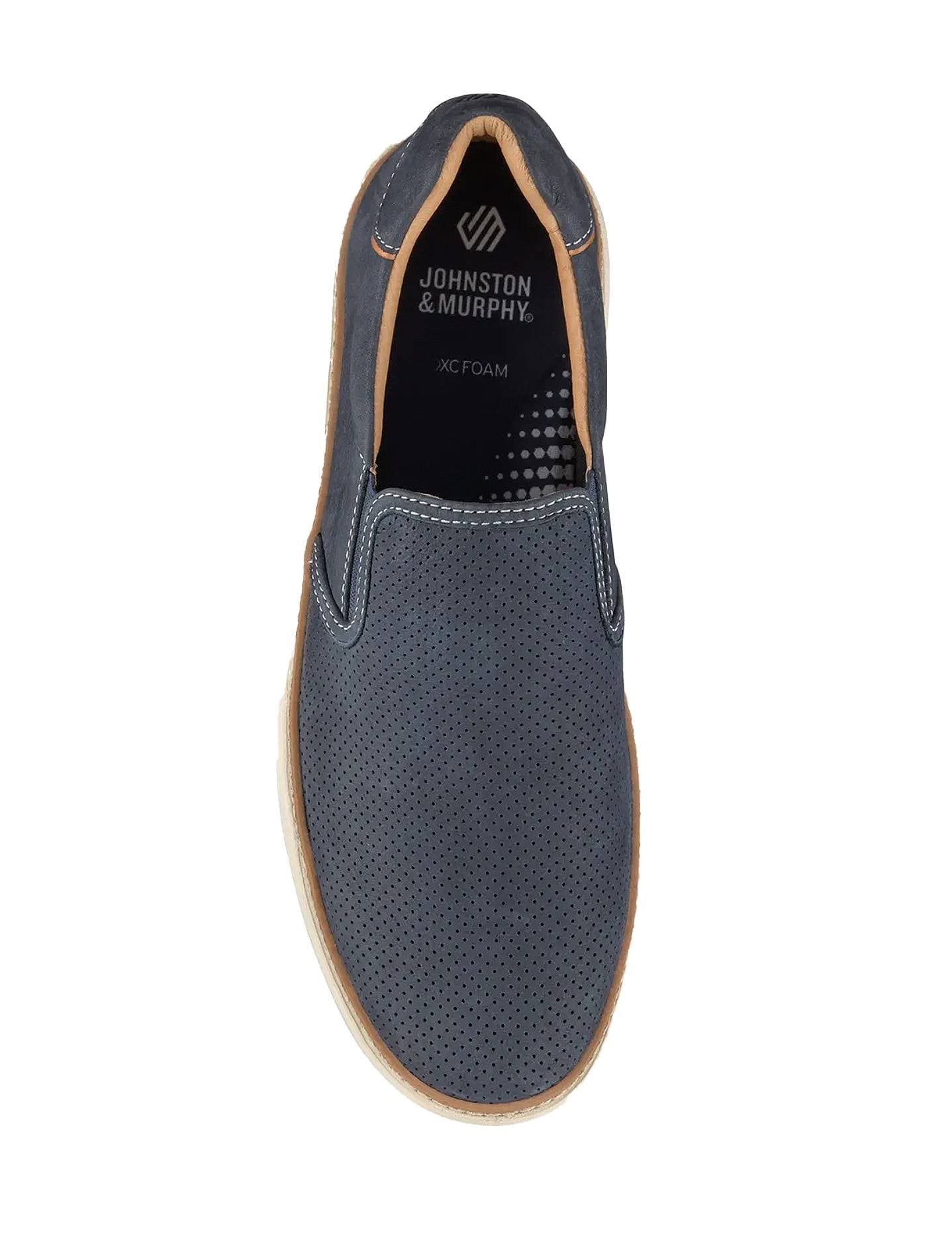 A single navy slip-on shoe with perforated detailing and light brown trim.