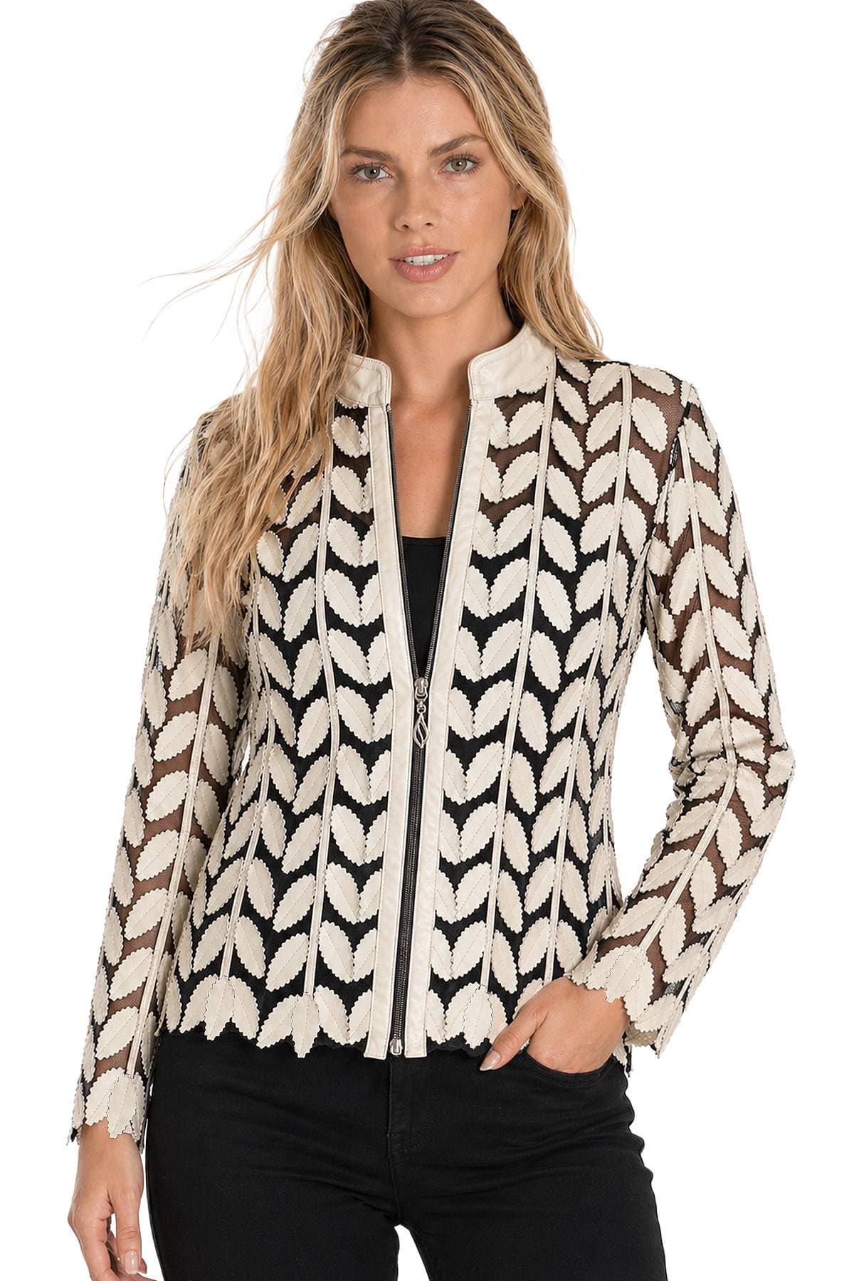 A woman wearing a black and white leaf-patterned jacket with a front zipper.