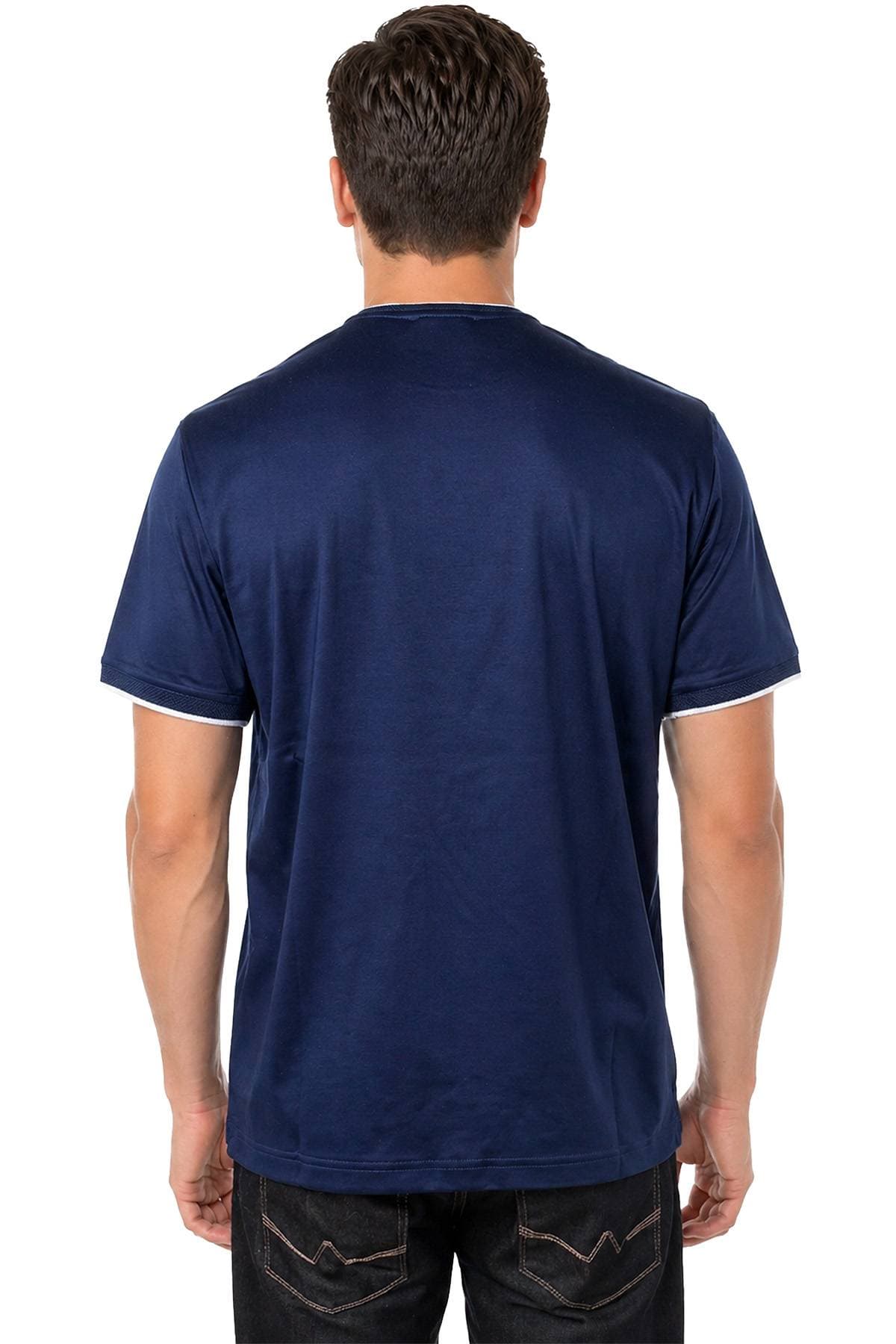 A person wearing a navy blue T-shirt and dark jeans, shown from behind.
