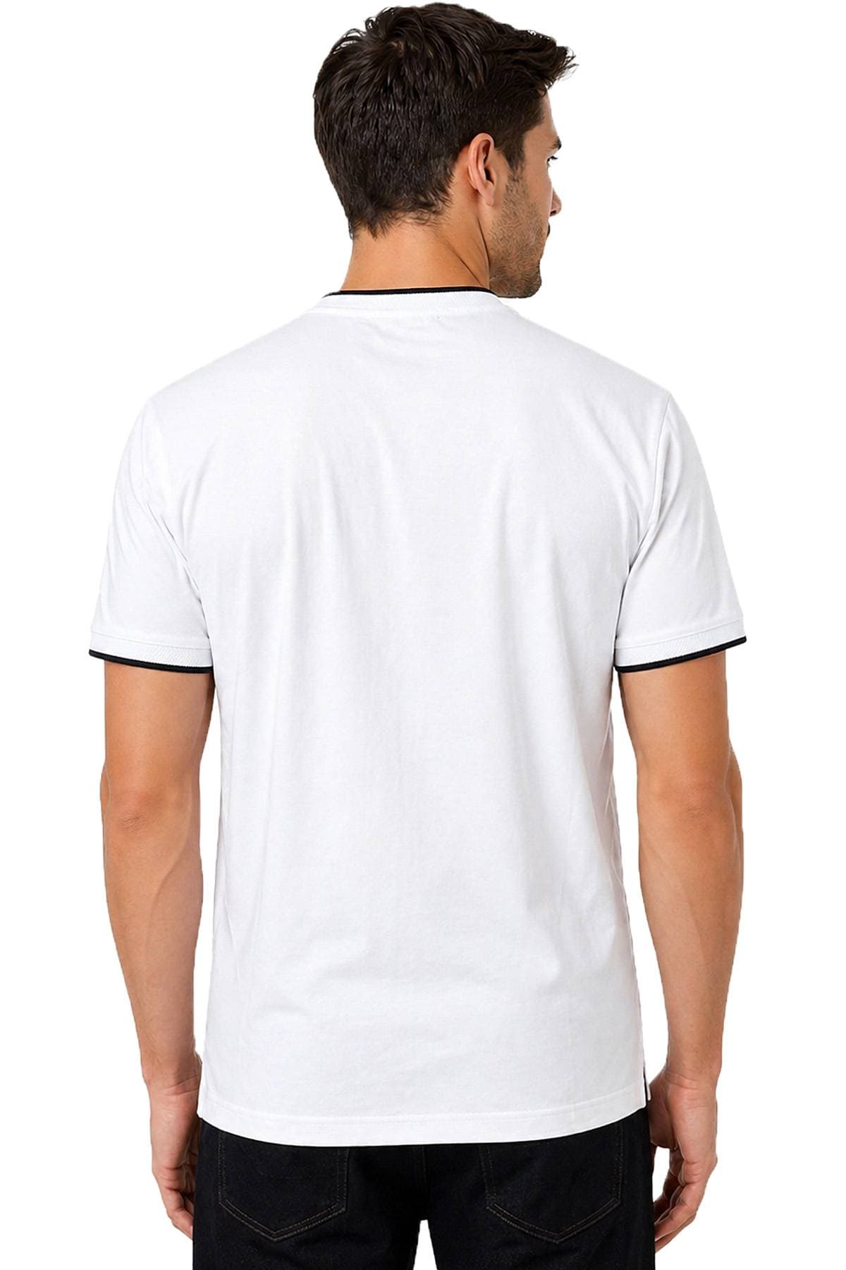 A man wearing a plain white T-shirt with black trim stands facing away.