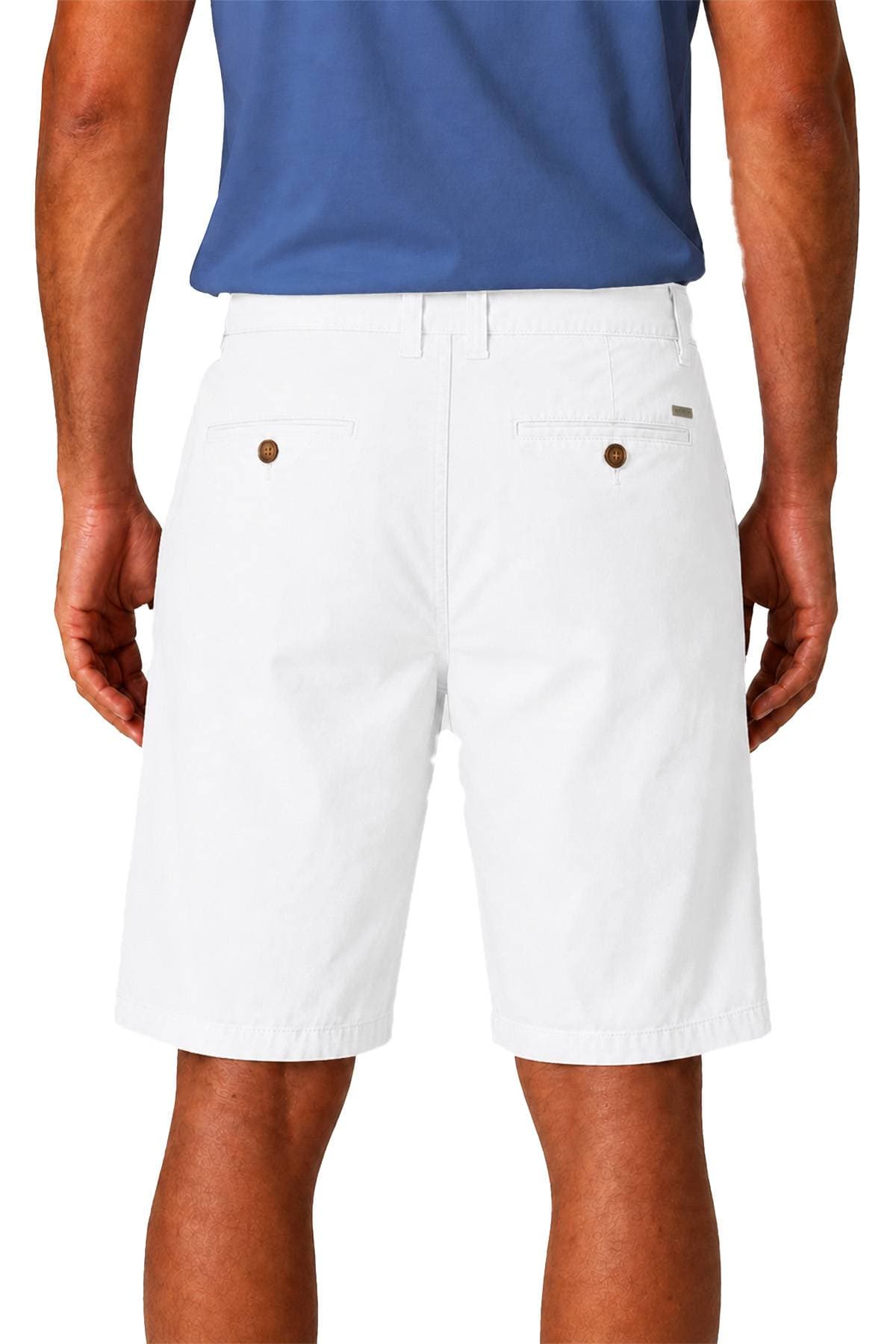 A person is wearing white shorts with rear pockets and a blue shirt, shown from the back.