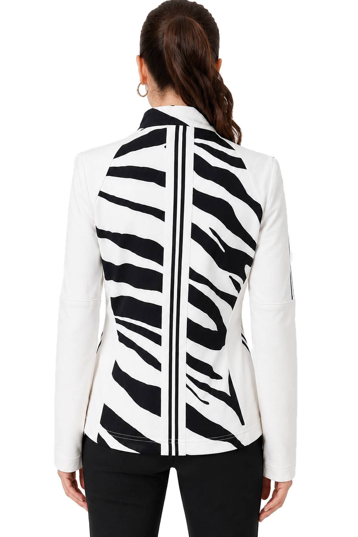 A person wearing a white blazer with black zebra stripes, viewed from the back.