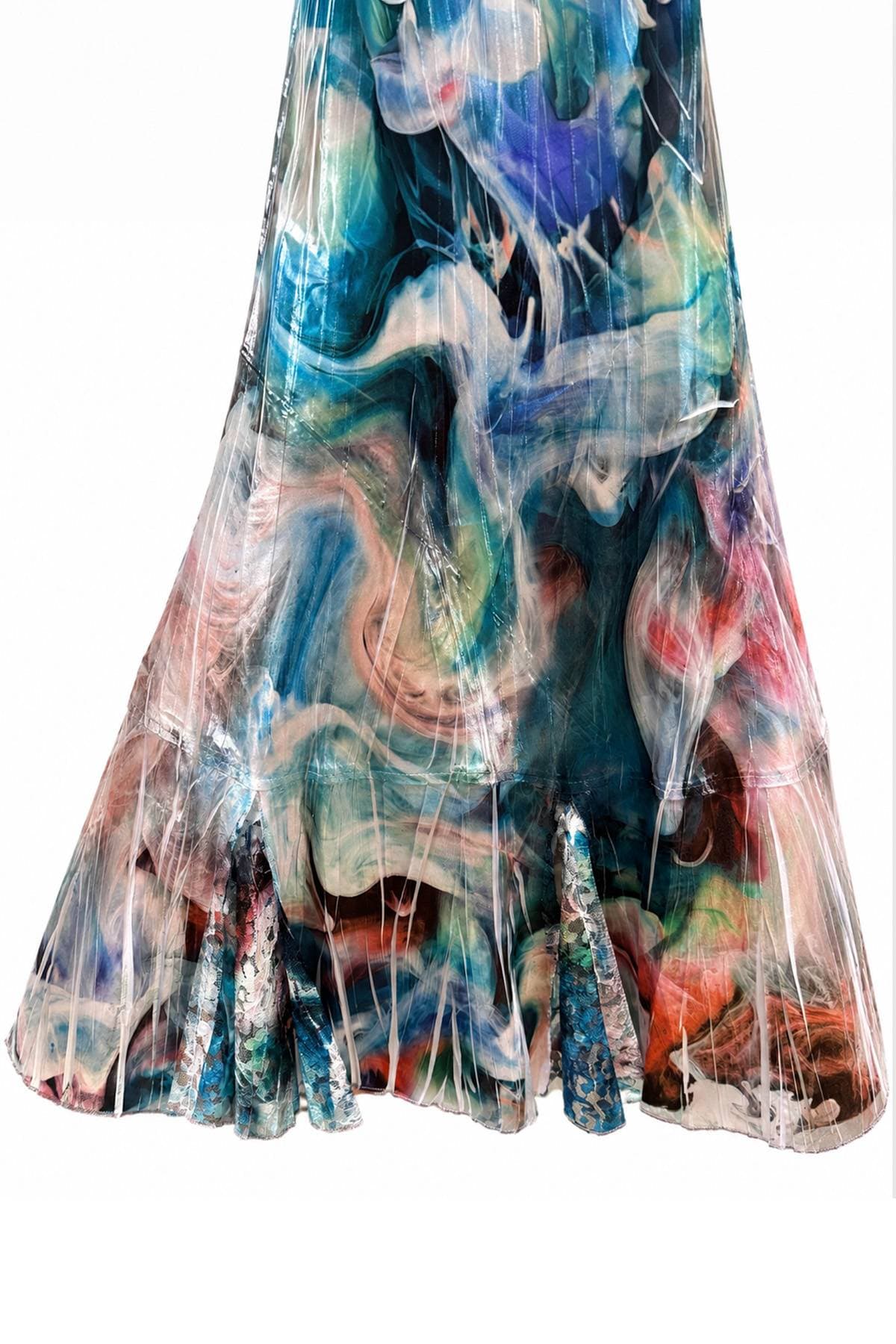 A colorful, abstractly patterned dress with a flowing, wavy design.
