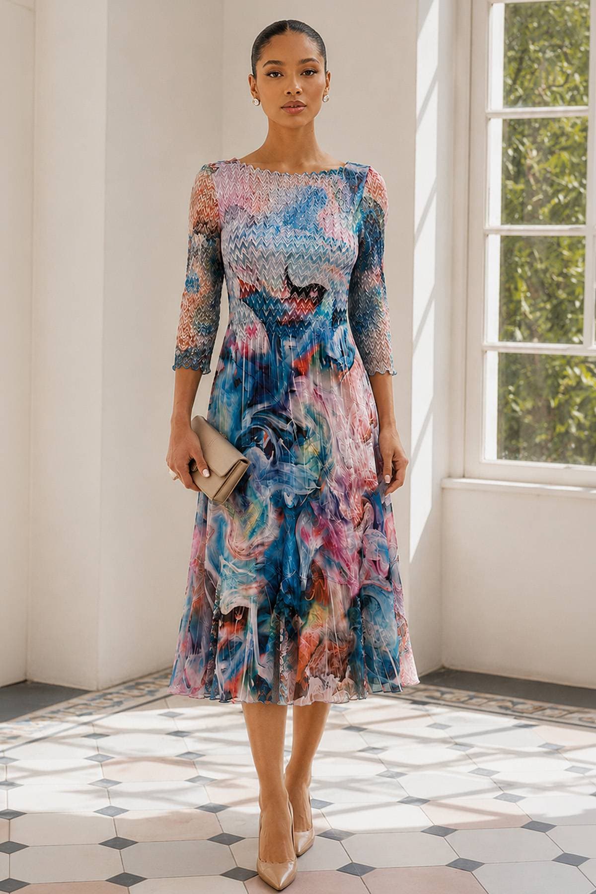 A woman wearing a colorful, abstract-patterned dress and holding a beige clutch.