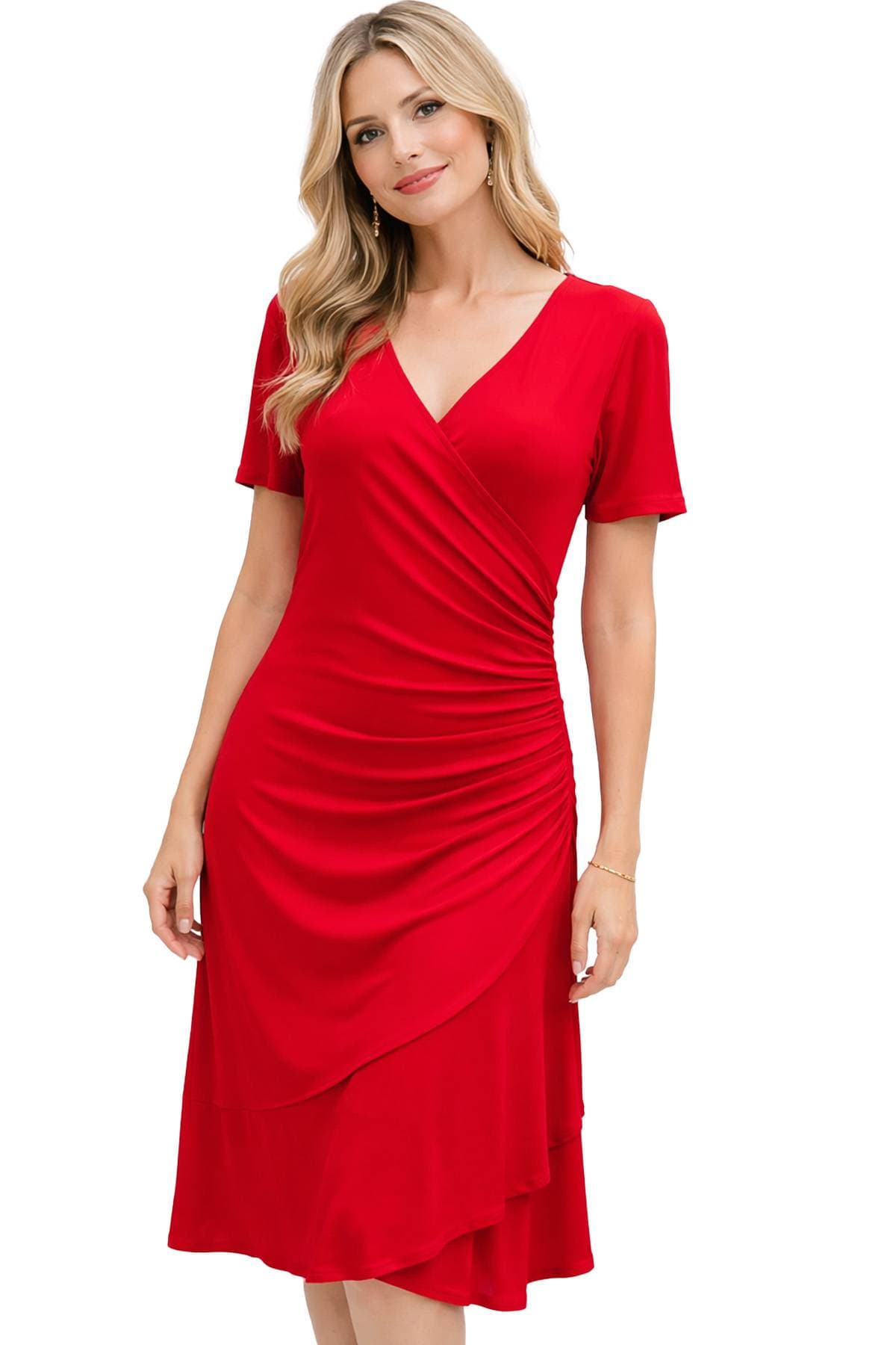 A woman wearing a red, fitted, short-sleeve dress with a wrap-style design.