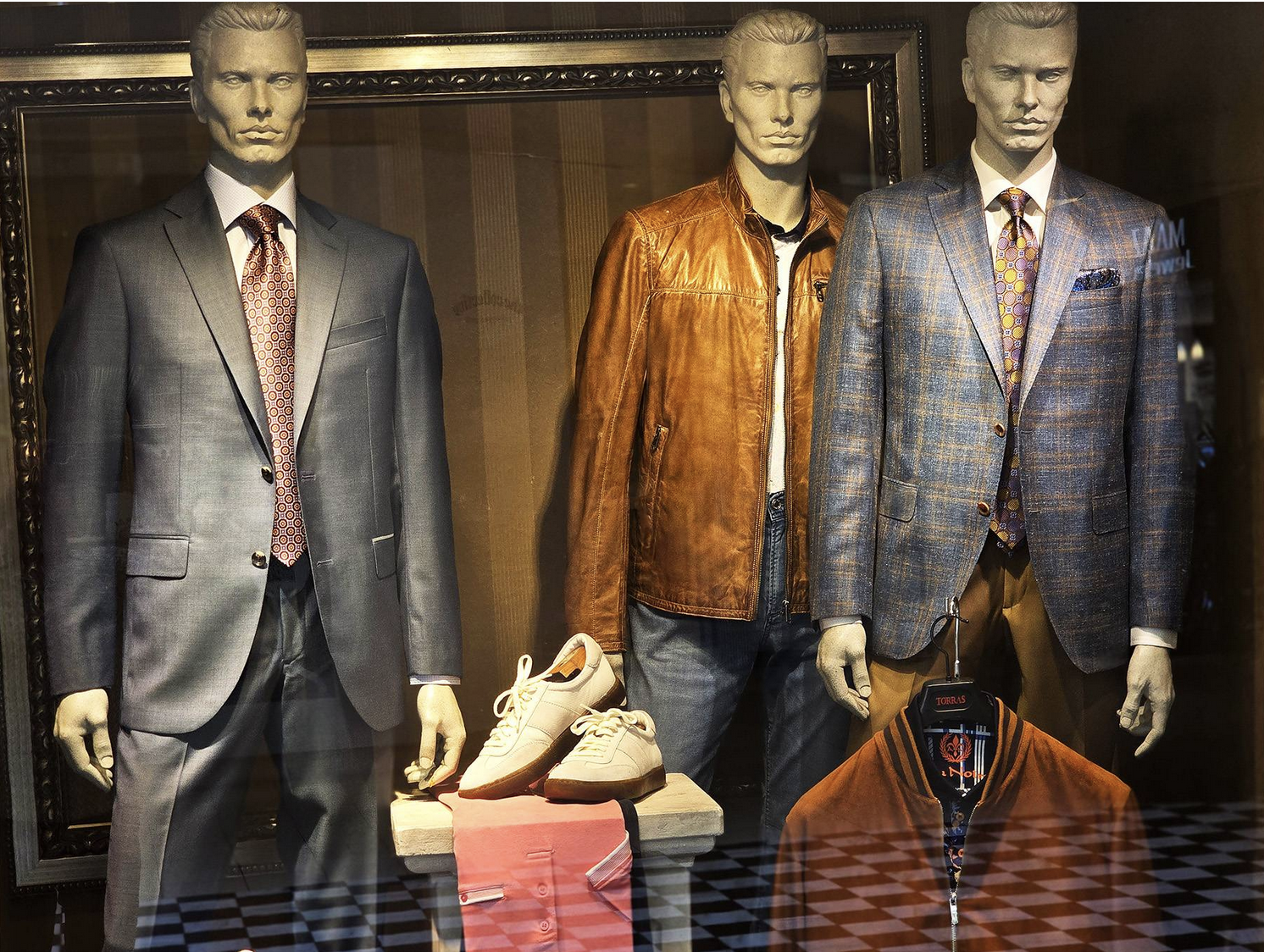 Men's store interior with clothing racks and merchandise displays