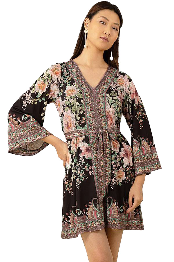 Elegant black mini dress with subtle floral pattern and sophisticated design